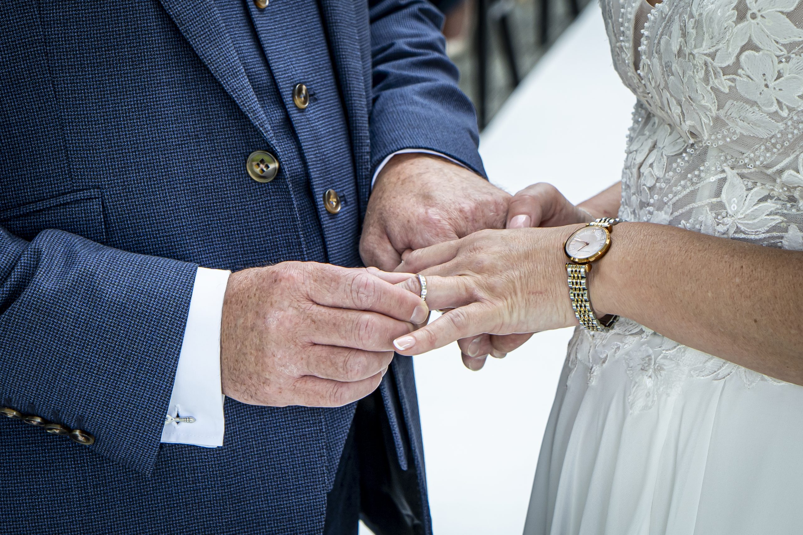 Bride and Groom exchanging rings