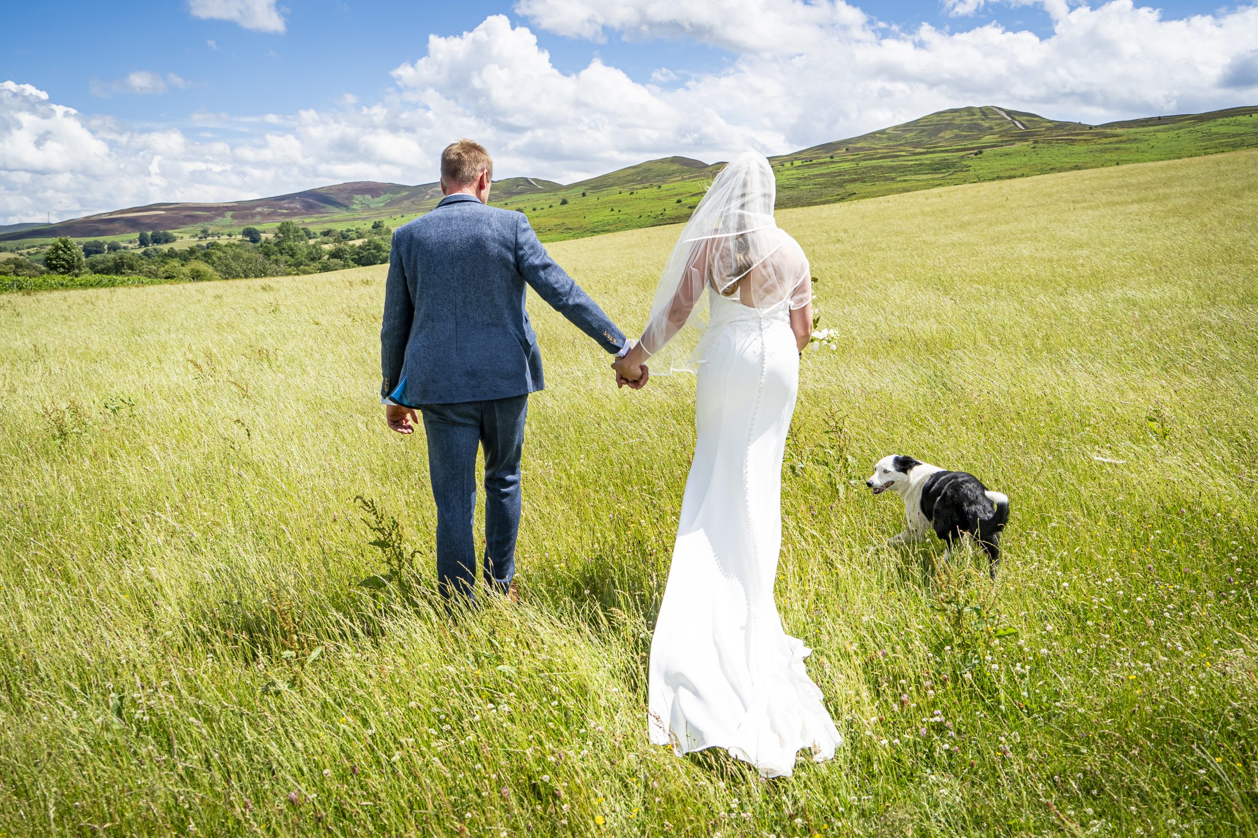 Bride and Groom walking hand in hand